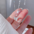 Colgante de plata con forma de mariposa